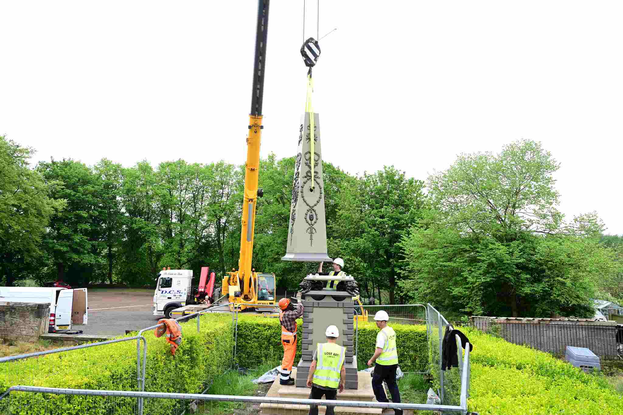 Obelisk being lowered into position