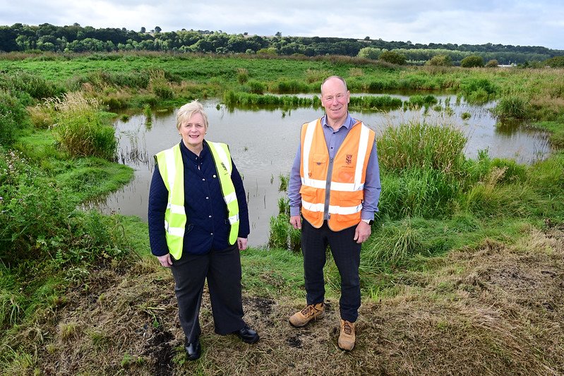 Council leader and John Kirkhope standing on the former site