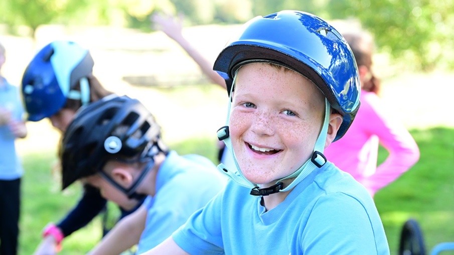 Smiling young cyclist