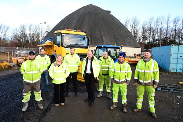 Cllr Garner at the salt dome with roads team