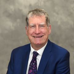 A photograph of Councillor Jim Flynn