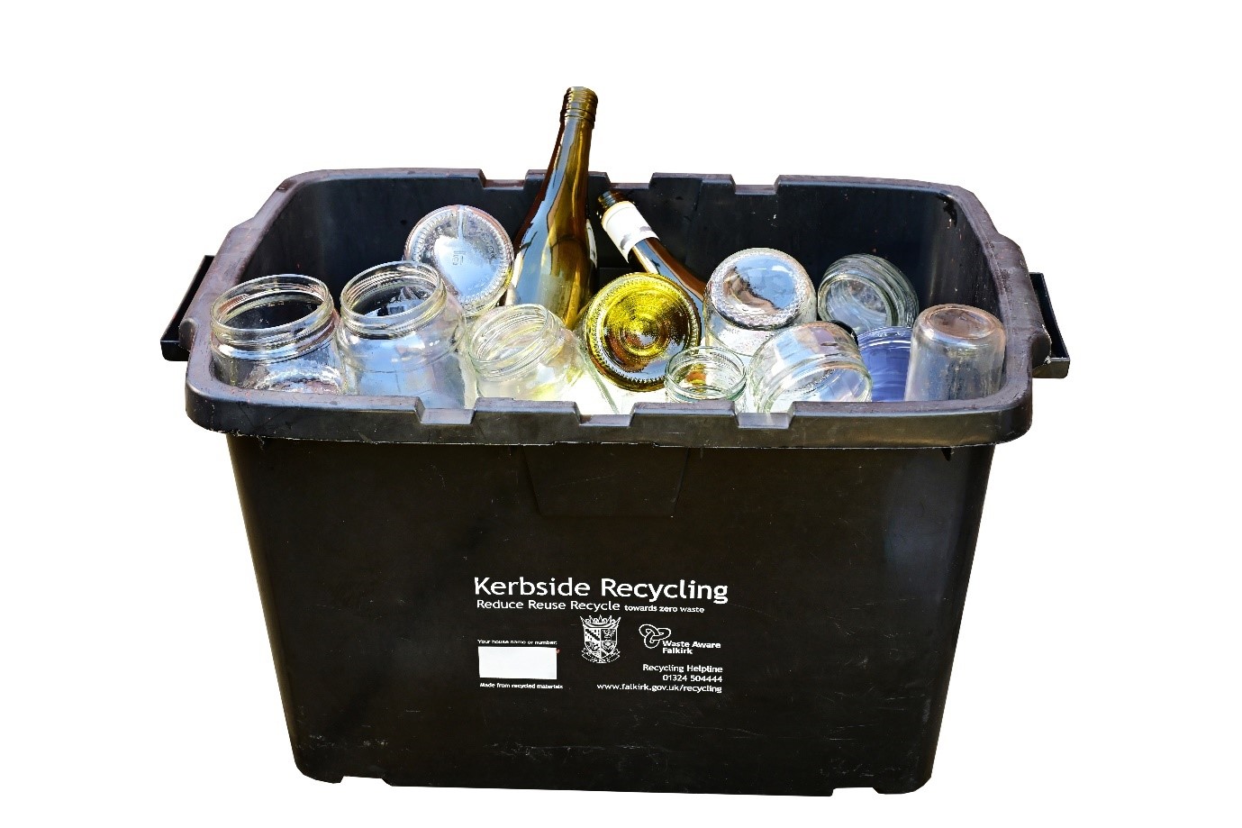 Photograph of black box filled with glass jars and bottles