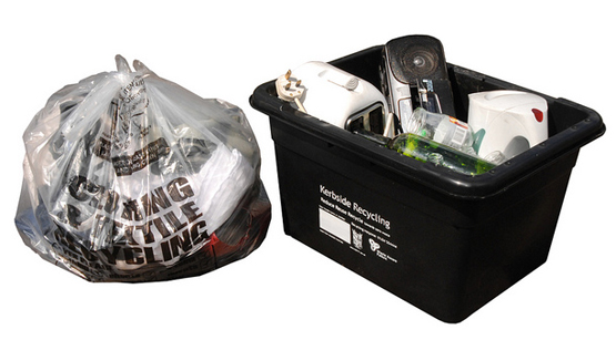 a picture of a black box and a textile bag filled with items for recycling